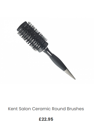 A silver knife with a black handleDescription automatically generated with low confidence